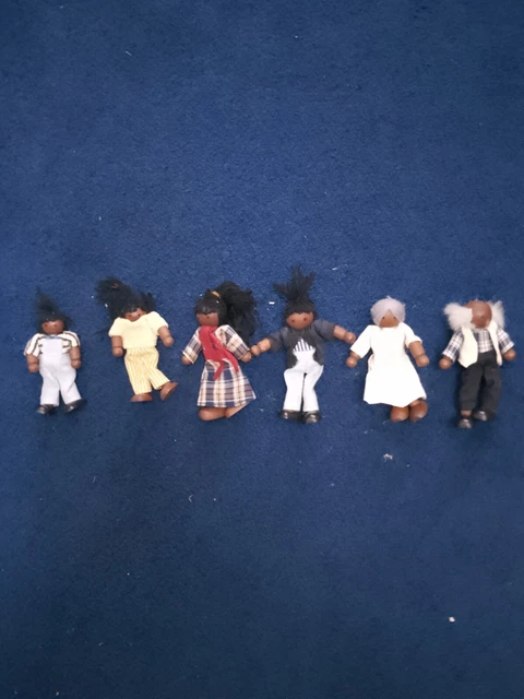 Collection of 6 small ethnic doll family