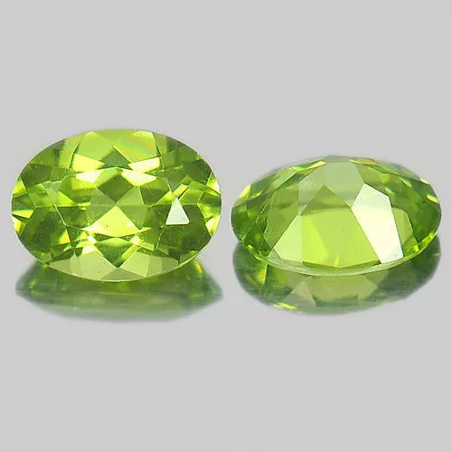 A PAIR OF 6x4mm OVAL-FACET STRONG-GREEN NATURAL AFGHAN PERIDOT GEMSTONES