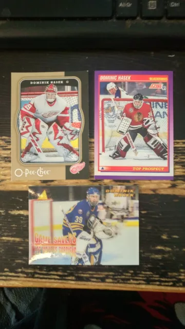 GREAT LOT of DOMINIK HASEK HOCKEY CARDS INCLUDING HIS ROOKIE CARD!