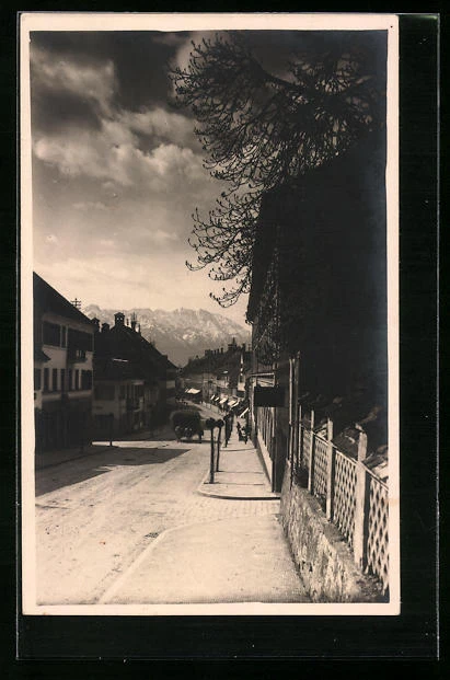 AK Murnau, Blick durch Straße mit Kutsche