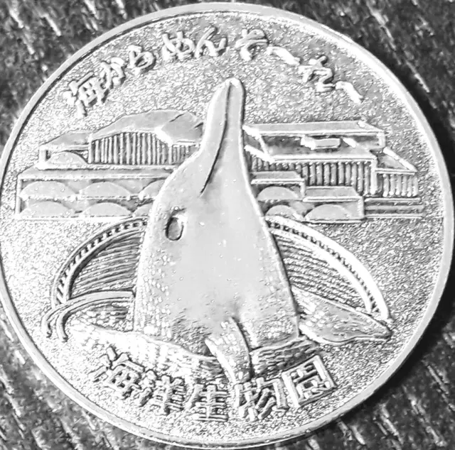 https://www.picclickimg.com/WsUAAOSwHuplJCIk/EXPO75-OKINAWA-INTERNATIONAL-OCEAN-Commemorative-Dolphin-Coin-Very.webp