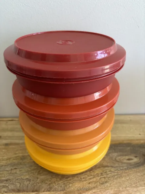 https://www.picclickimg.com/Wt8AAOSwjdRliVpv/Vintage-Set-Of-4-Tupperware-Harvest-Colors-Bowls.webp