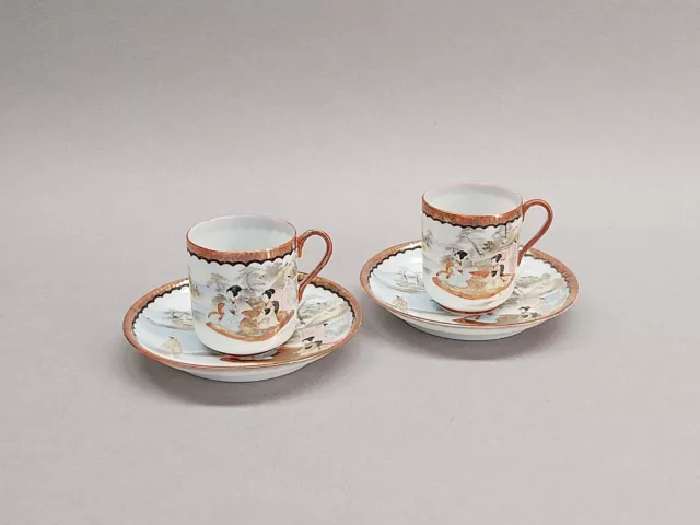 A Pair Of Vintage Porcelain Hand Painted Japanese Coffee Cups & Saucers.