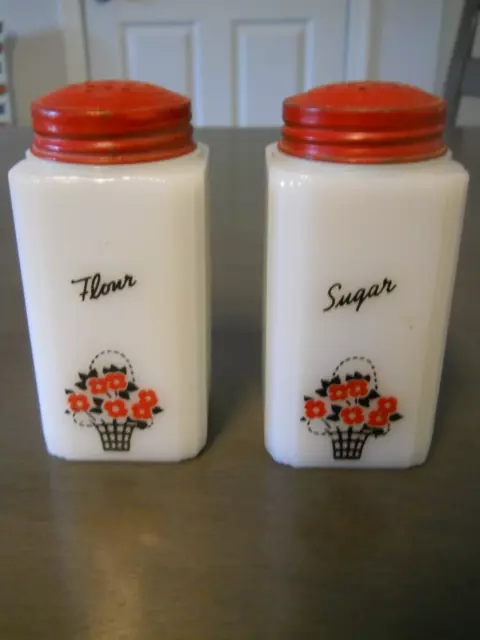 Vintage Tipp Flour And Sugar Shakers White Milk Glass Flower Basket Red Lids Set