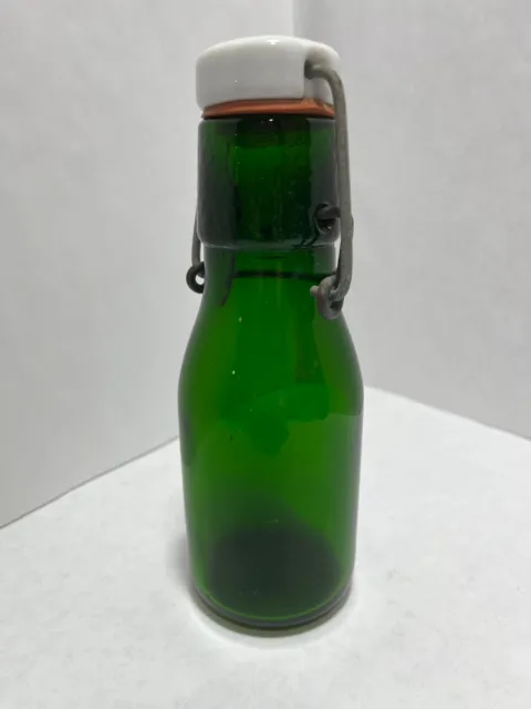 Vintage green colored bottle with top swing wire porcelain lid