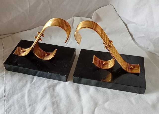 Paire de serre-livres en forme de tête de canard en laiton moulé patiné