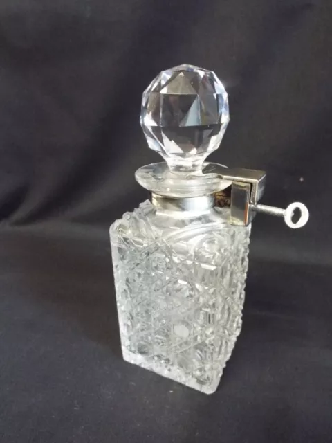 Rare antique cut glass decanter with Betjemann's Patent lock