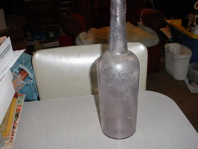 Embossed Purple Glass Liquor Bottle Hellman Dist. Co. St. Louis, Mo