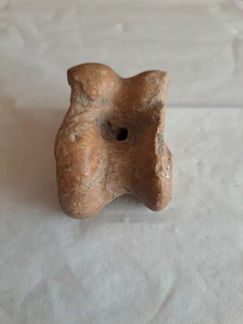 Amuleto prehistórico en hueso "taba". perforado. exvoto-adorno ?? 6x4x3 cm.