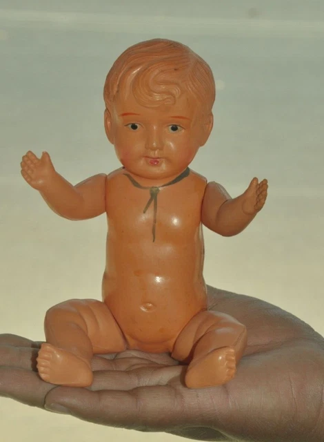 Ancienne poupée bébé en celluloïd des années 1920 en papier