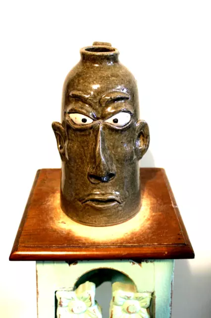 wayne hewell  face jug, pottery, folk art  10''x 6''