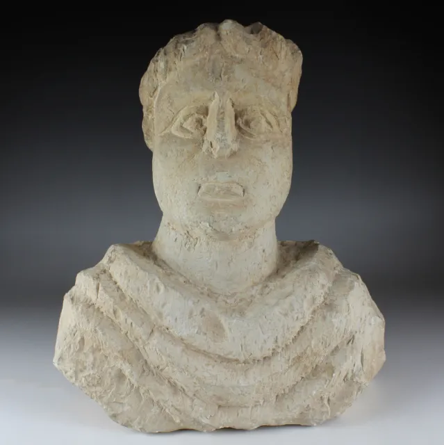 Roman funerary bust of a man limestone toga imperial Beth-Shean / Sebaste