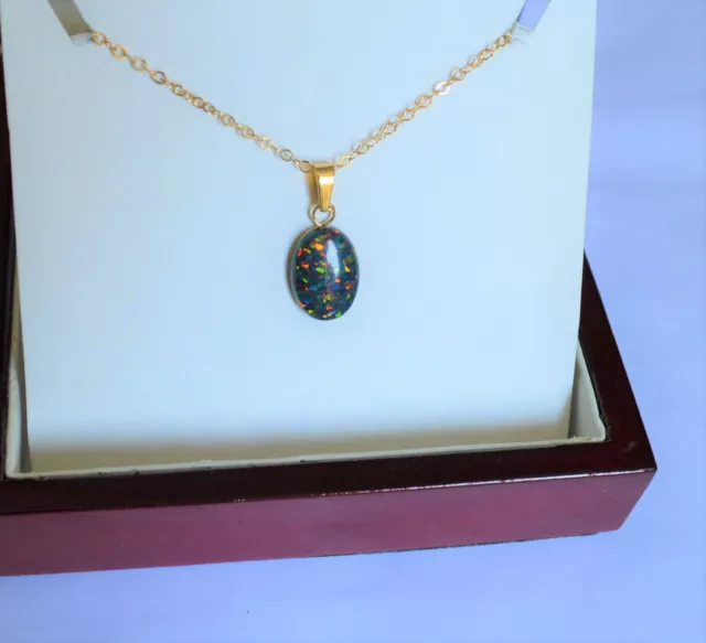 Beautiful Blue/Black Fire Opal Cabochon Oval Wire Wrapped Yellow Gold Pendant