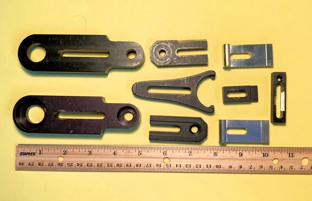 Odd lot of 9 optical table clamps for mounting hardware, Newport, NRC, etc.