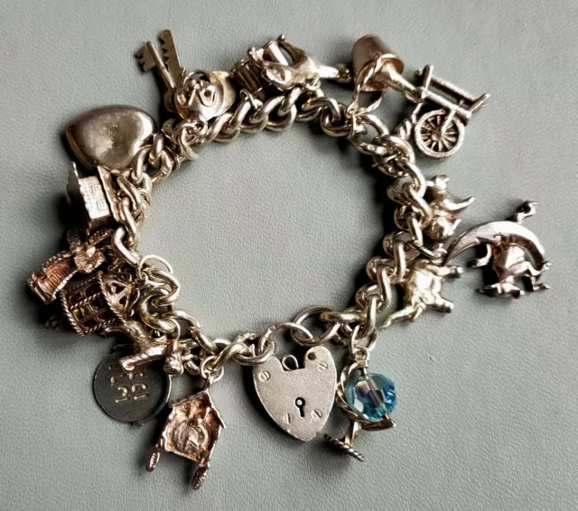 Solid Silver Charm Bracelet With 17 charms