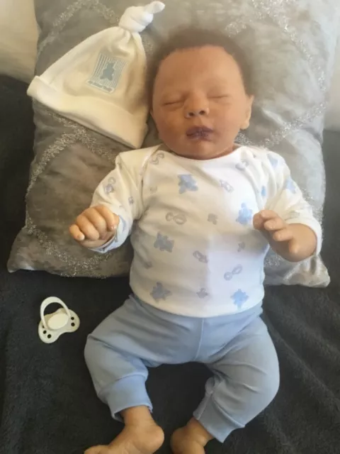 Beautiful newborn, mixed race reborn baby boy doll. Hand rooted hair.  19.5 ins.