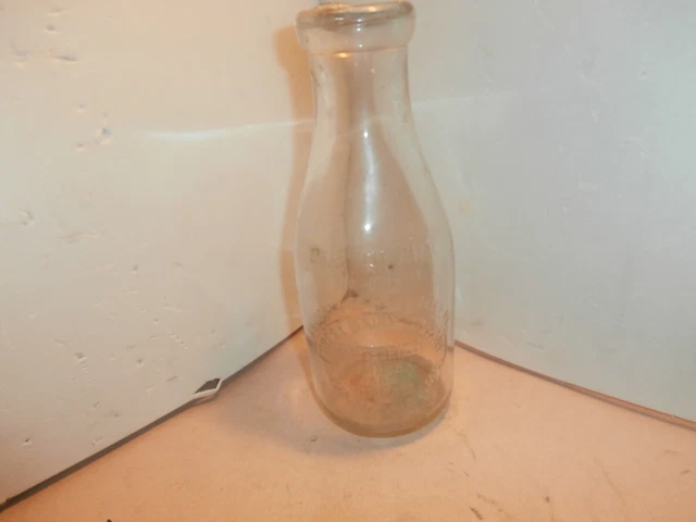 Forest Dairy Company quart milk bottle,  Kansas City, Mo. Milk and cream