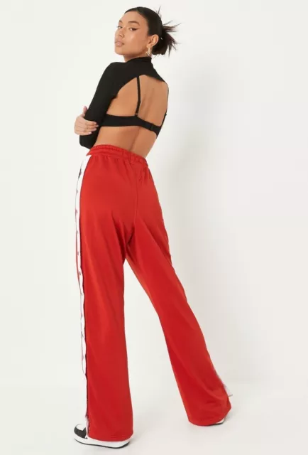 Missguided pink playboy joggers hotsell