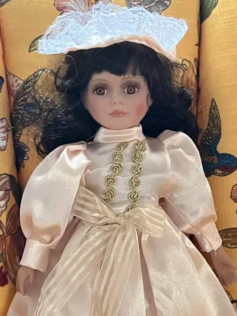 Porcelain Victorian Doll in Peach/Ivory Gown