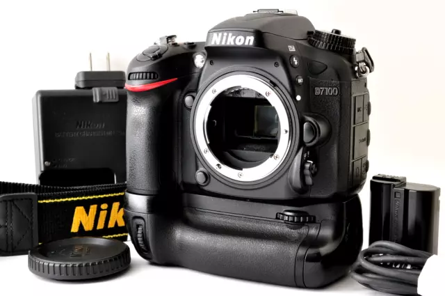 TOP MINT Nikon D7100 Digital SLR Camera Body 8200 shots 24.1 MP with MB-D15
