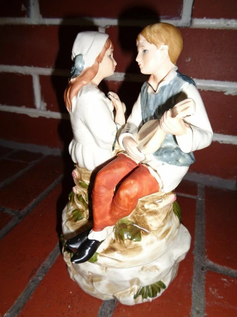 Vintage hand painted German porcelain boy w/mandolin & girl music box