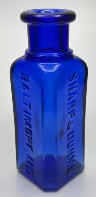 Blue Triangular Roundback Poison Bottle Embossed BALTIMORE MD 3.25" tall (d)