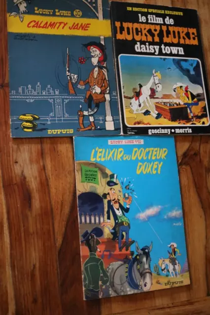 lot 3 BD Souples  LUCKY LUKE.. L'élixir du Docteur Doxey 1969 calamity jane 1970