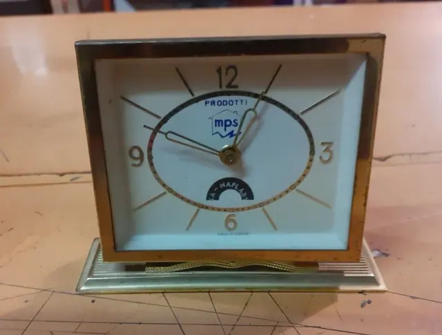 orologio da tavolo pubblicitario vintage meccanico