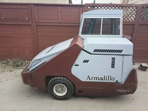 Power Boss Armadillo sweeper. LPG Powered