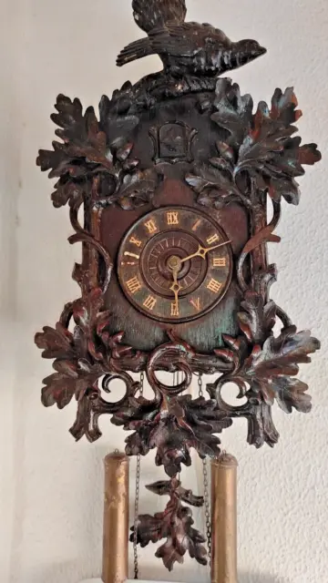 Vintage cuckoo clock, handmade on wood, 1900-1940.