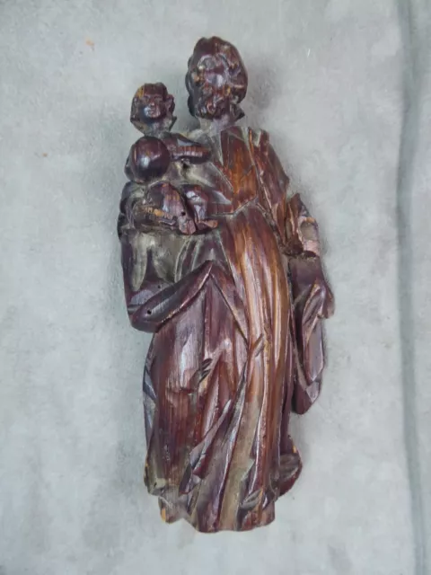 SAINT JOSEPH et L'ENFANT JESUS, en bois sculpté ancien.