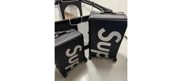 Supreme rimowa topas sales multiwheel 82l black