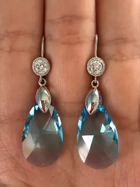 Brilliant Round & Pear Clear & Blue CZ Pear Dangle Style 925 Silver Earrings