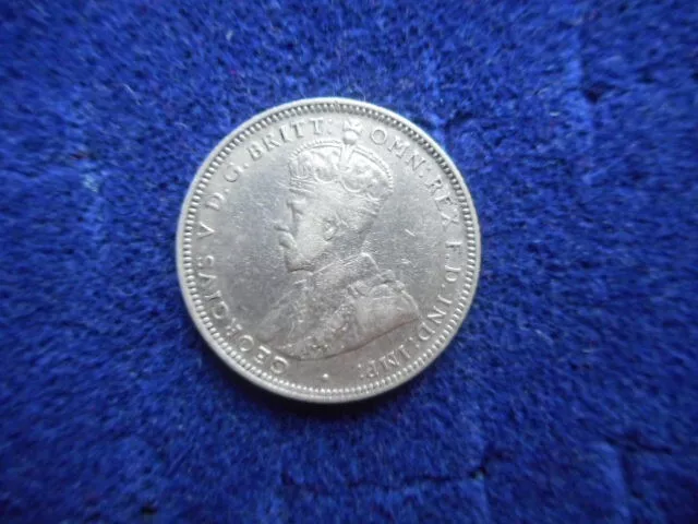 nice grade British West Africa 1913 shilling.
