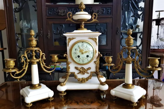 Antique French White Marble And Gilt Mantel Clock Garniture.