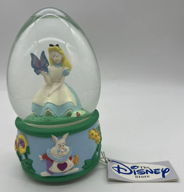 ALICE IN WONDERLAND Snow Globe Disney Plays Playful Melody Disney Snowglobe NWT ALICE IN WONDERLAND Snow Globe Disney Plays Playful Melody Disney Snowglobe NWT