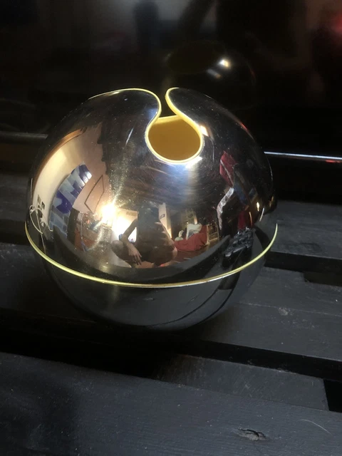 Sfera scultura Gio Pomodoro per Alessi numerata acciaio polipropilene giallo