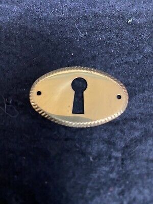 4 Oval Key Escutcheons Brass  Dresser Cabinet NOS Reproduction Keyhole covers