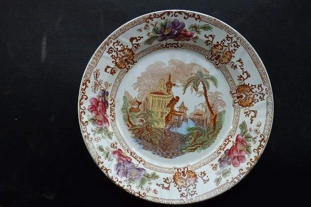 Ancien plat creux en faïence de Longwy modèle Cyprus
