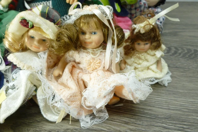 Lot of 11 Bisque Porcelain Cloth Jointed Doll Figurines American Mint DanDee 5