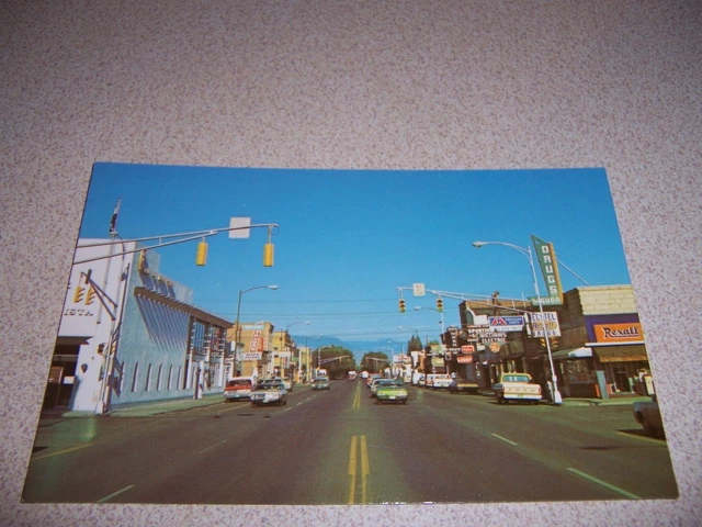 1960s DOWNTOWN STREET SCENE REXALL DRUGS MONTE VISTA COLORADO VTG POSTCARD
