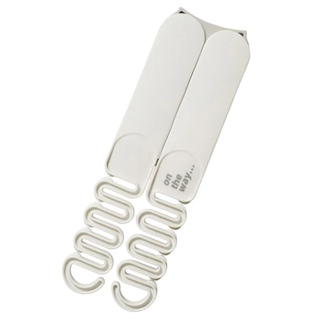 Percha plegable colgante para viajar a casa amarillo lechoso