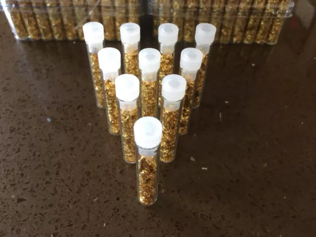 10 X Glass Vials Filled With Gold Leaf Flakes. Approx 2 Inches Tall.