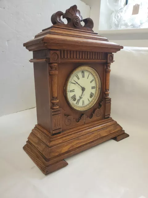 Attractive Oak chiming mantle clock. Strikes hours full working several days