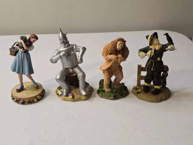 WIZARD OF OZ Set of 4 Figurines By Enesco 1999 Dorothy Scarecrow Tin Man Lion