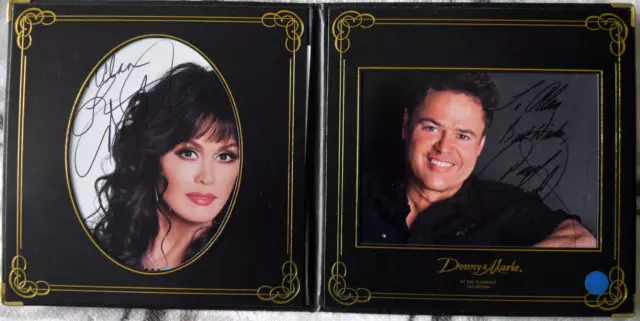 Donny and Marie Osmond Original Hand Signed Photo in a Photo Folder