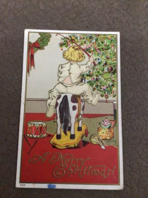 EARLY 1900s EMBOSSED CHRISTMAS GREETINGS PC - CHILD ON HORSE