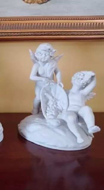 Porcelain figurine Putti Angels celebrating the grape harvest Sitzendorf