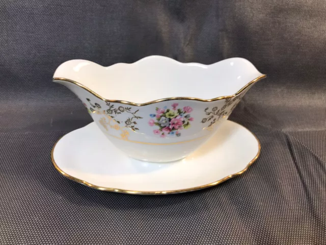 Ancienne saucière de table en porcelaine de Sologne Larcheveque avec dorures