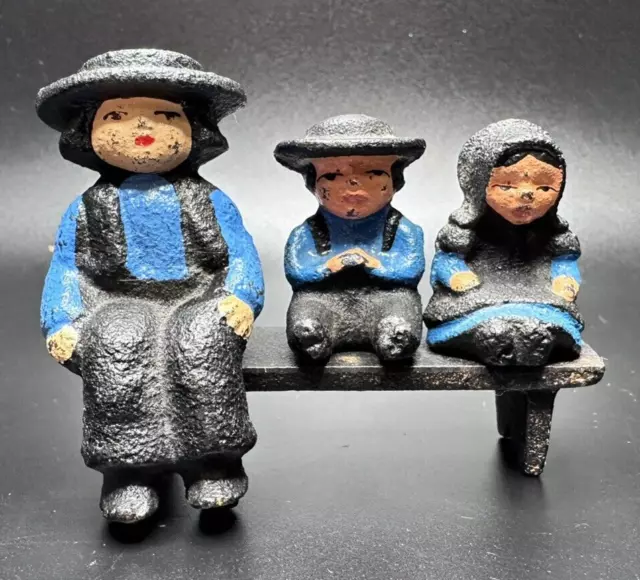 Vintage Miniature Cast Iron Sitting Amish Man Boy & Girl w/ Bench Black Blue